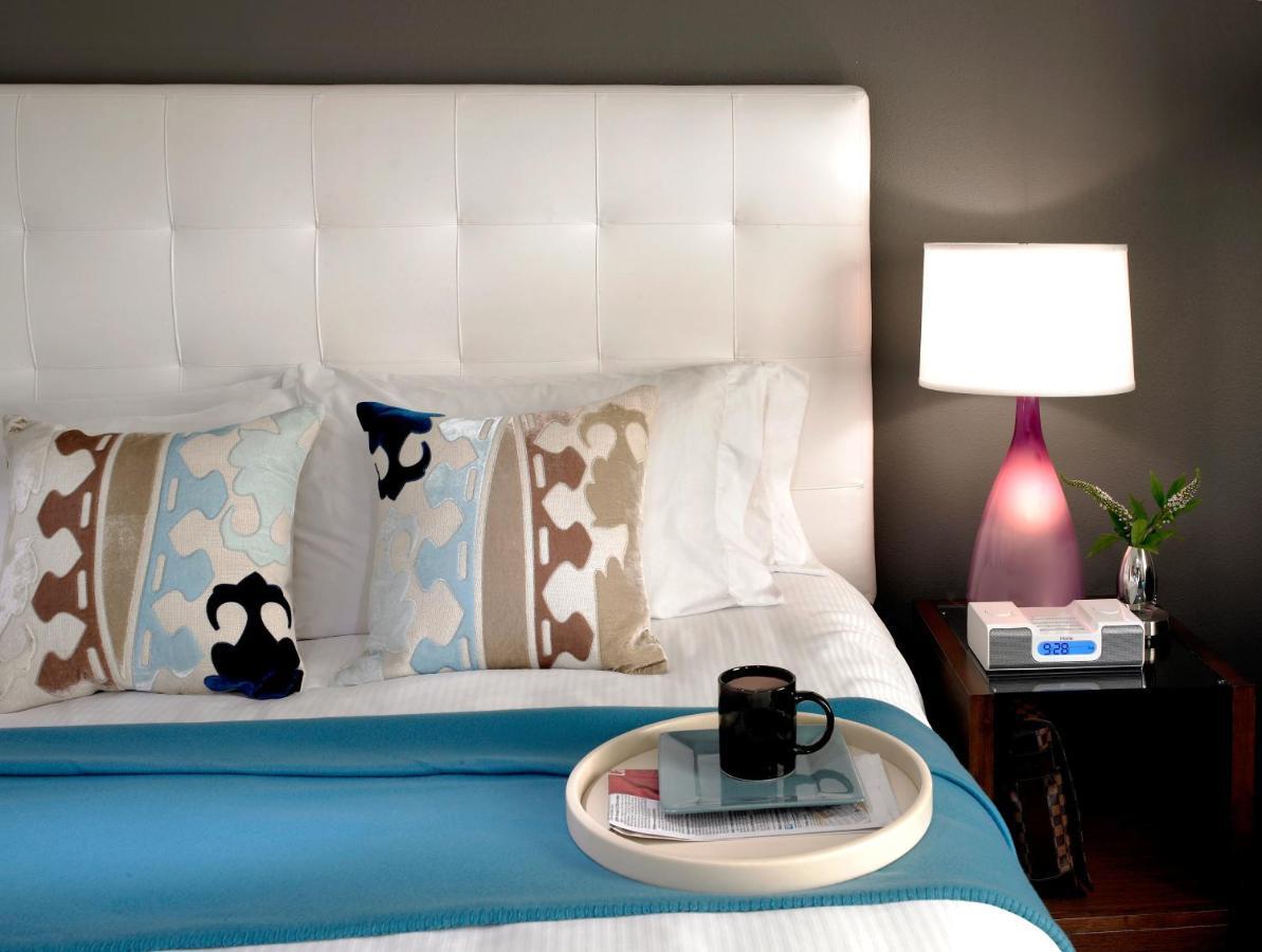 Hotel Murano Tacoma Ruang foto A bedroom at the Hotel Indigo in San Francisco